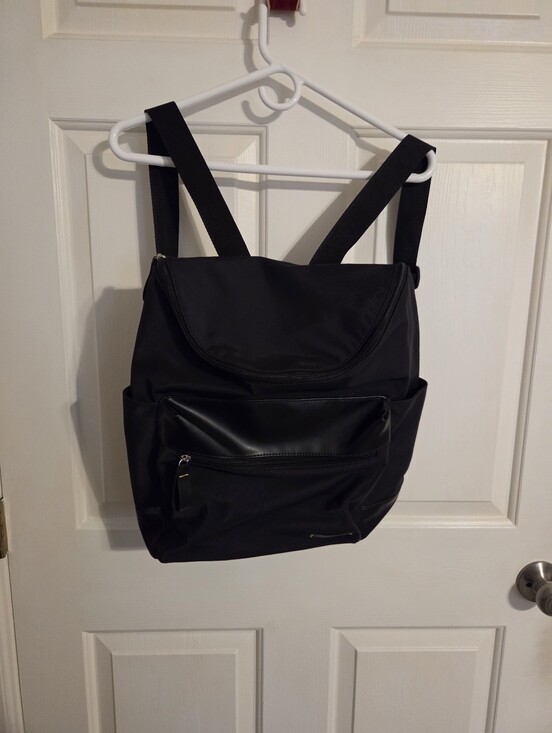 Calvin Klein Handbags - Calvin Klein Black Backpack with Faux Leather Accents
